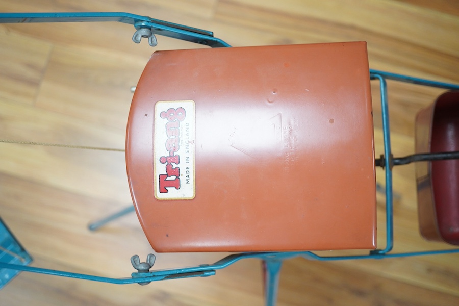 A 1950s Tri-ang large scale tinplate dockside crane with accessories including; a metal bucket, a plastic wrecking ball, etc. 88cm high to top of cab. Condition - fair to good, small patches of surface rust and some mino